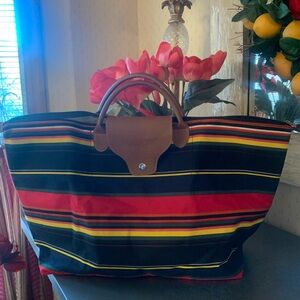 Joann Merit Designs, foldable large waterproof tote. Zip closure, snap over.